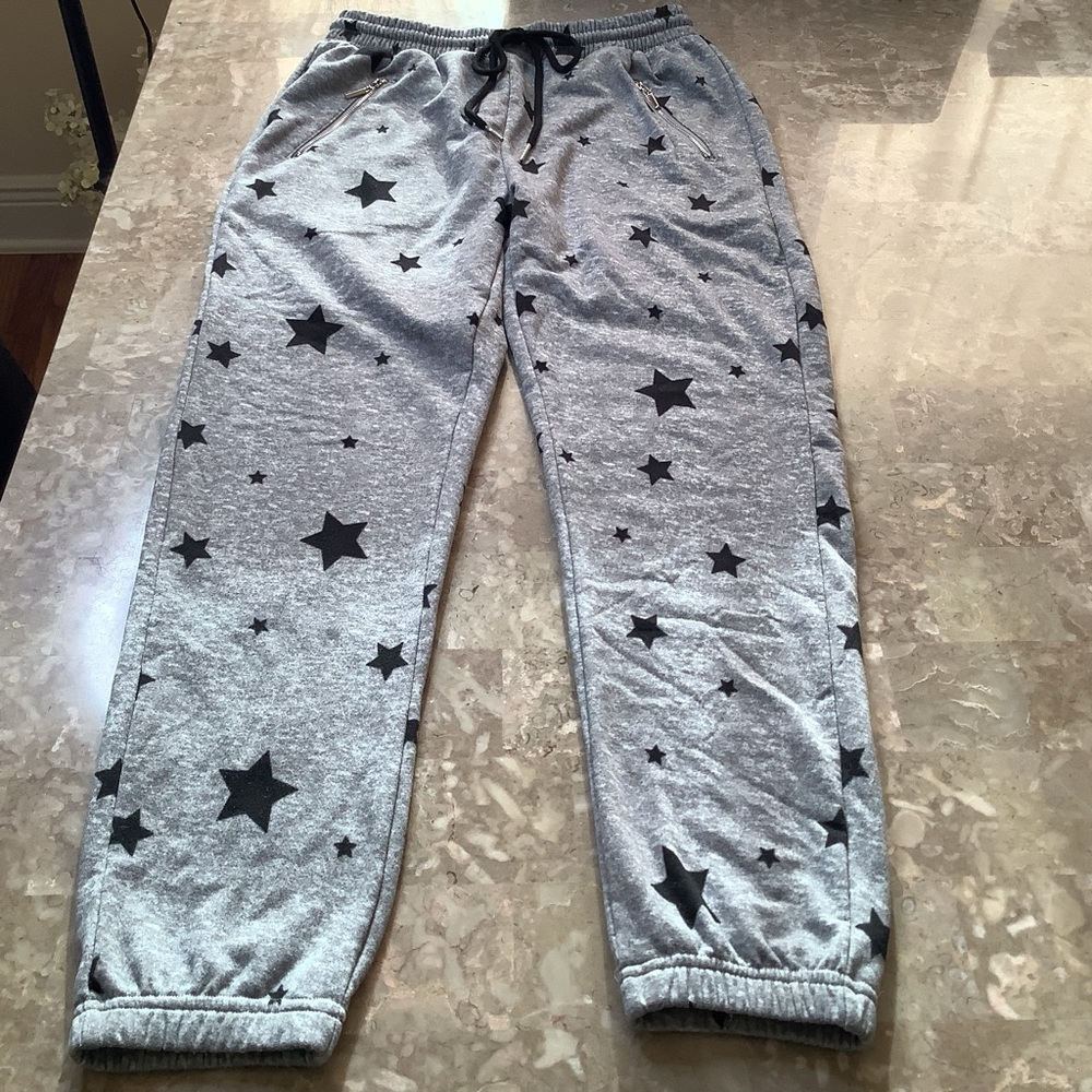 B-Indero Sweatpants, gray w/star design,zip close pockets, elastic tie waist S/M